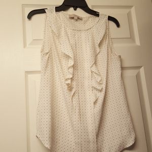 Cute sleeveless,  ruffle front blouse